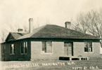 Historical photo of an early hospital building.